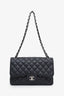 Pre-loved Chanel™ 2013-14 Black Caviar Leather Quilted Classic Jumbo Double Flap Bag SHW