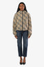 Jean fuselé en denim bleu Brunello Cucinelli, poche ornée de monili, taille 0