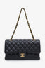Pre-loved Chanel™ 2023 Black Quilted Caviar Medium Classic Double Flap