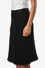 Mini-jupe Chanel™ d’occasion en tweed noir à laine, boutonnée « Lions Head », taille 36