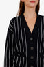 Pre-loved Chanel™ 23P Black Cashmere Striped CC Logo Cardigan with Mini Skirt Sizes 36 and 34