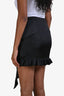Mini-jupe Remain noire en satin à volants, taille 4