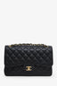 Pre-loved Chanel™ 2013-14 Black Caviar Jumbo Classic Double Flap Bag