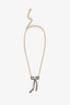 Collier Chanel 20A avec nœud CC, chaîne en cuir et finitions dorées