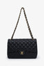 Pre-loved Chanel™ 2011-12 Black Caviar Leather Quilted Classic Jumbo Double Flap Bag