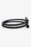 Bracelet jonc Hermès en cuir tressé noir et métal en forme de H « Tournis Tresse »
