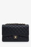 Pre-loved Chanel™ 2011-12 Black Caviar Leather Quilted Jumbo Double Flap Bag