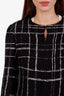 Pre-loved Chanel™ 23A Métiers d'Art Collection Black/White Plaid Tweed Coat Size 38