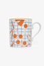 Hermès "Walk In The Garden" Porcelain Orange Mug